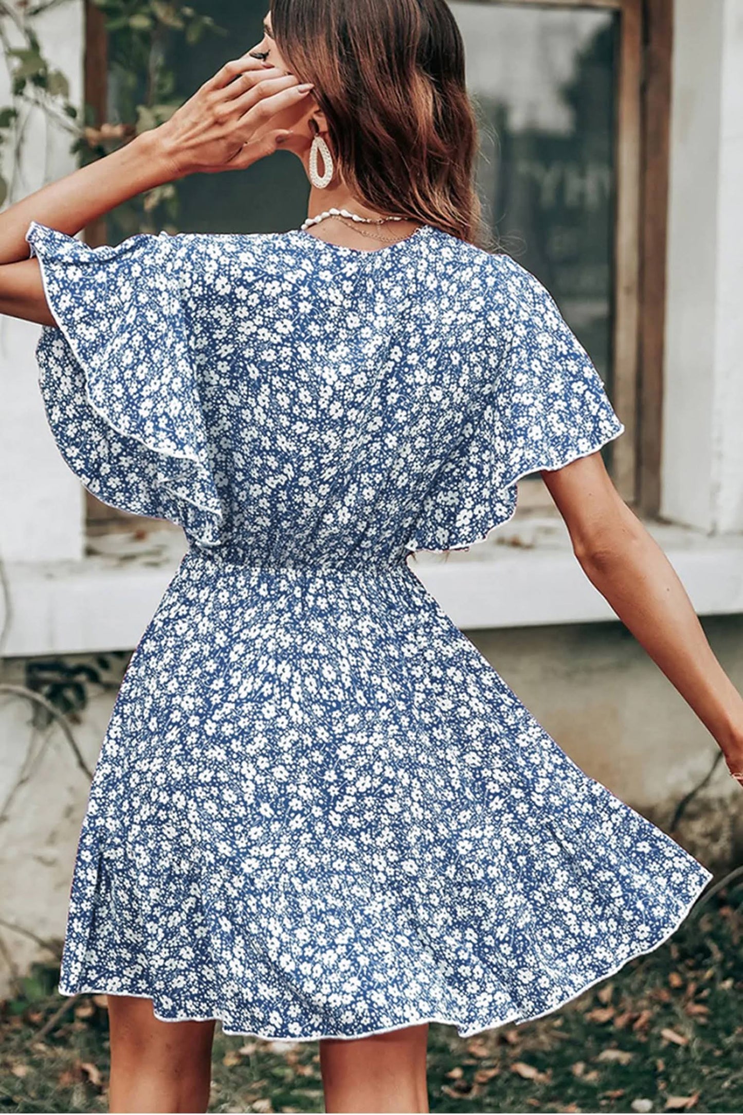 Robe à imprimé floral manches papillon à volants