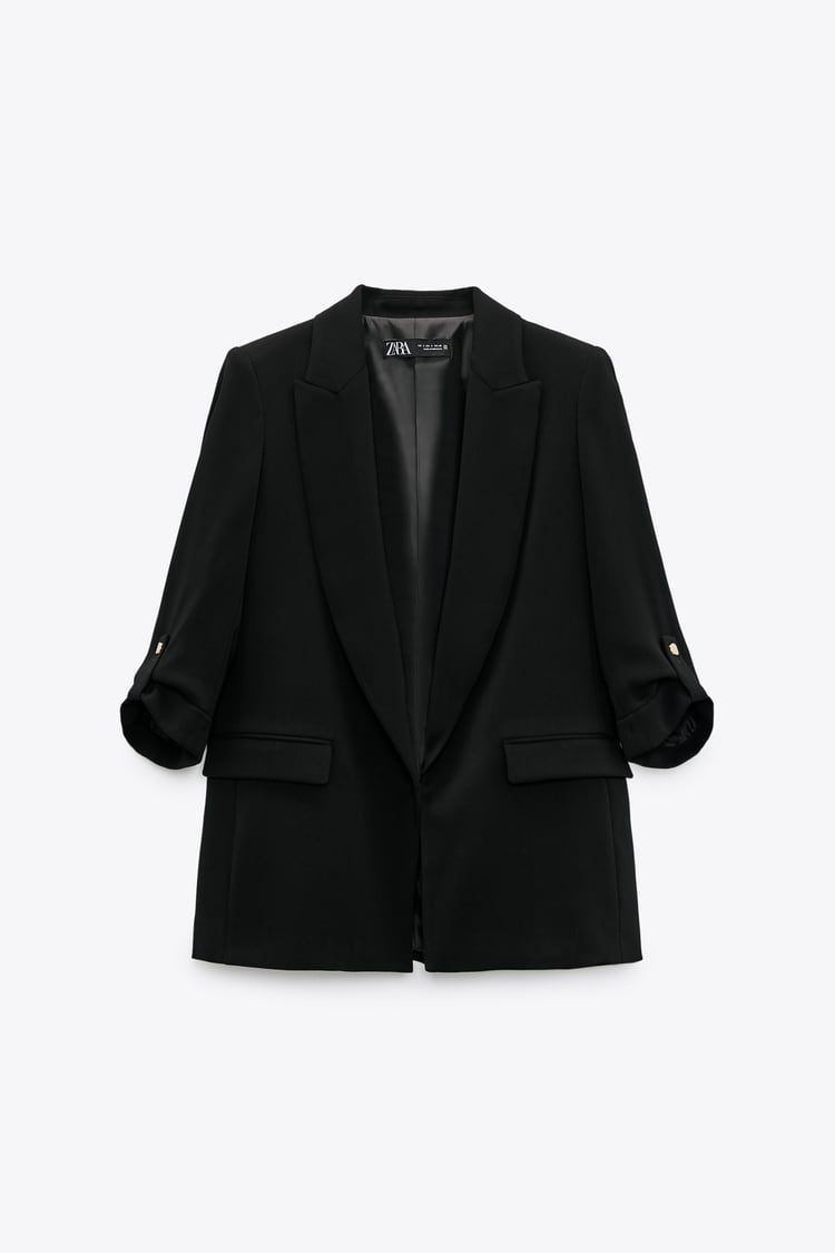 VESTE À MANCHES RETROUSSÉES