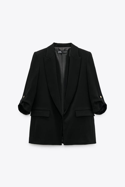VESTE À MANCHES RETROUSSÉES