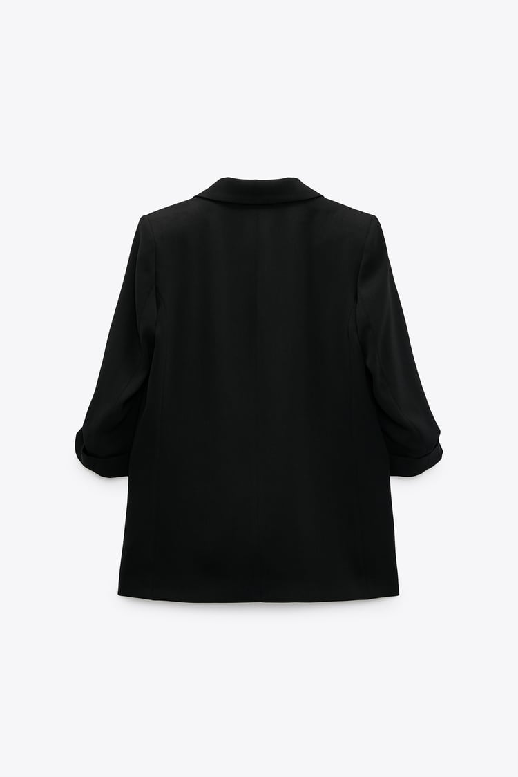 VESTE À MANCHES RETROUSSÉES