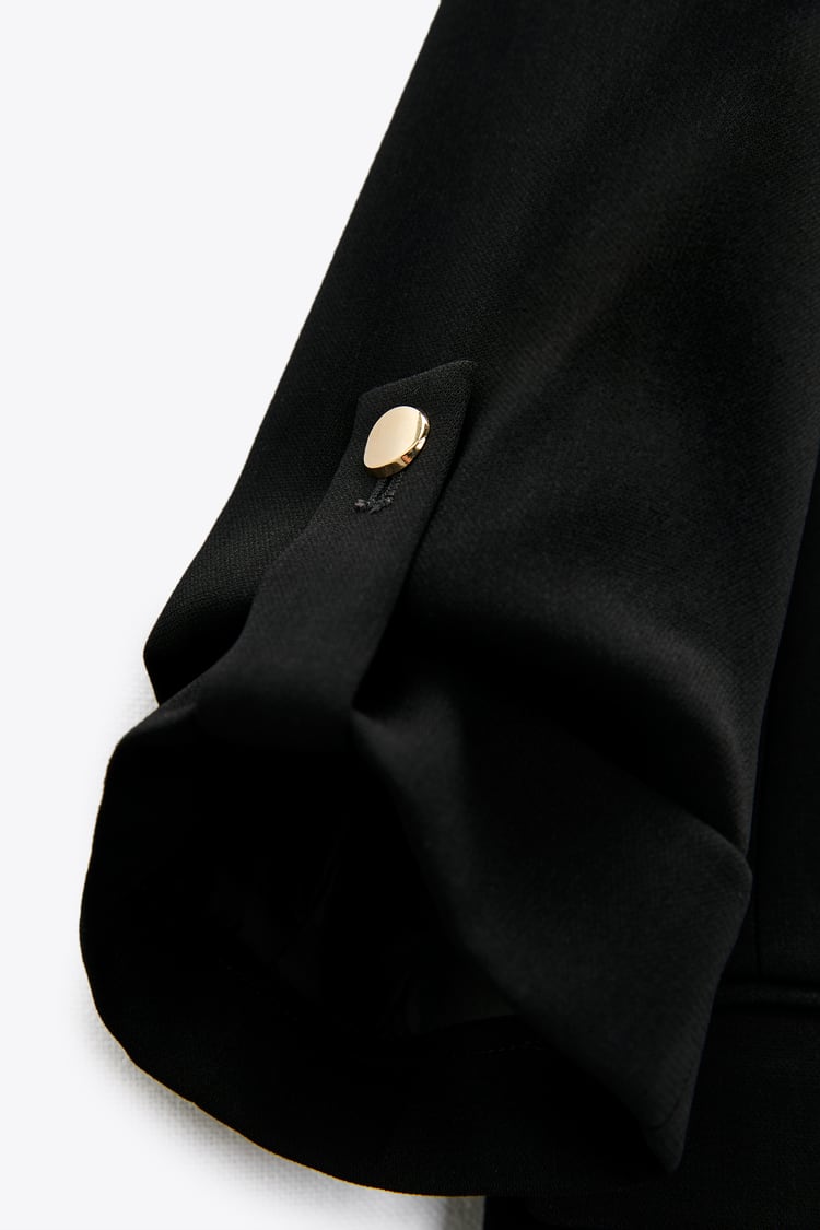 VESTE À MANCHES RETROUSSÉES